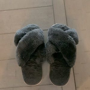Girls black slippers.